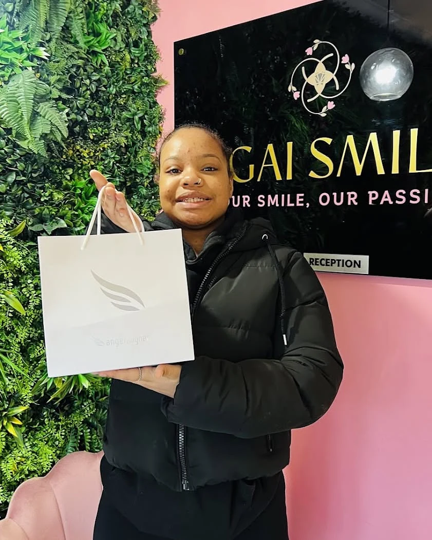 Happy Patient with Angel Aligner at Reception