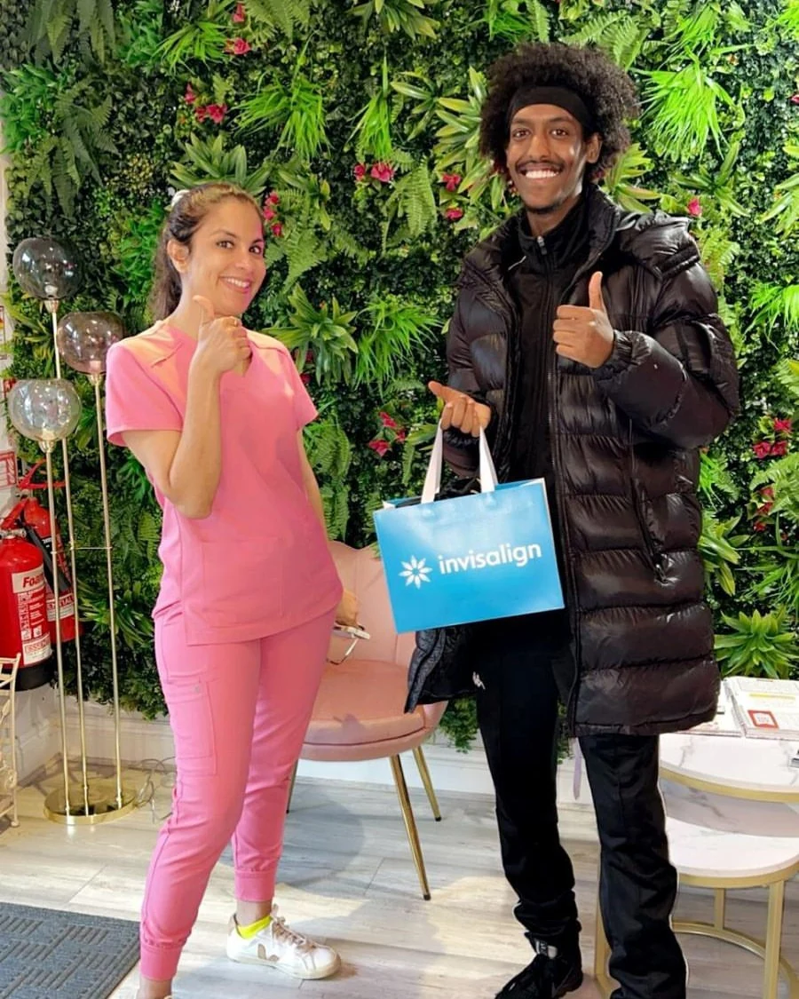 Dr. Aarti with Smiling Young Invisalign Patient