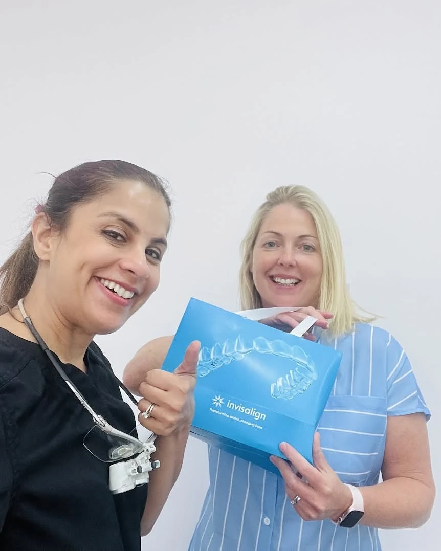 Dr. Aarti Kohli Jain with Happy Invisalign Patient at IKIGAI Smiles